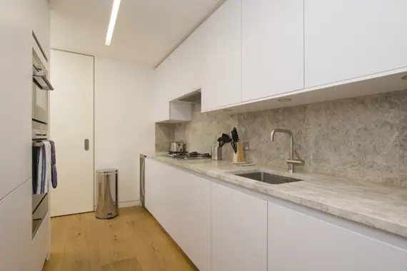 A typical bright and modern kitchen at Arne Street Apartments