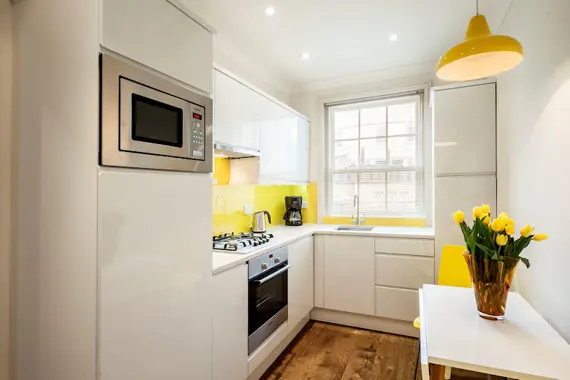 A bright kitchen fully-equipped with up to date appliances