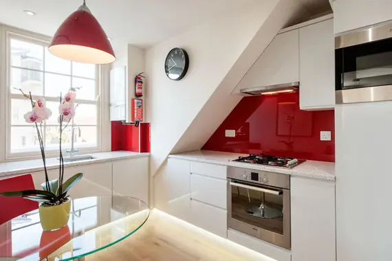 A modern kitchen fully-equipped with up to date appliances