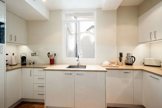 A gorgeous, light fully equipped kitchen