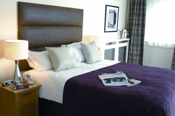 The cosy bedroom in a four bedroom apartment