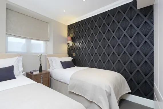 A cosy twin bedroom at Ashburn Court