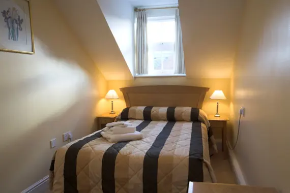 A cosy bedroom at Stanshawe Court