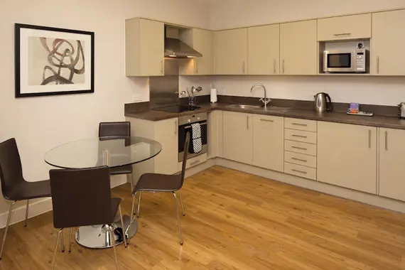 A sleek, modern kitchen in a two bedroom apartment