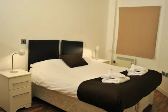A spacious bedroom at Bloom Street Apartments