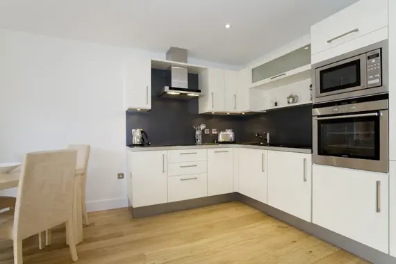 A spacious and fully-equipped kitchen at The Hamiltons