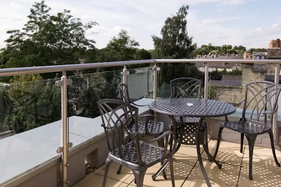 A terrace at The Hamiltons with an outdoor seating area