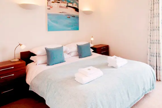 A bright and comfortable double bedroom at The Hamiltons