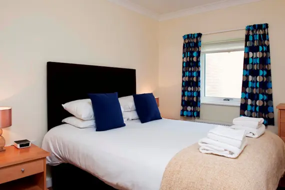 A bright and comfortable double bedroom at Market Rise