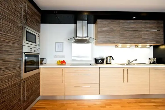 One of the fully equipped kitchens