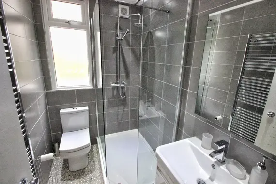 The Brooke Apartment offers a beautiful large walk-in shower and is finished with luxury porcelain tiles