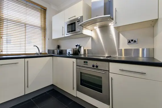 A typical modern kitchen fully equipped with up to date appliances