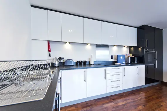 A modern kitchen fully-equipped with up to date appliances