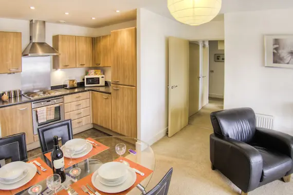 A fully-equipped kitchen and dining area at Waterside Park
