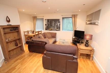 A omfortable, spacious living area in a two bedroom apartment