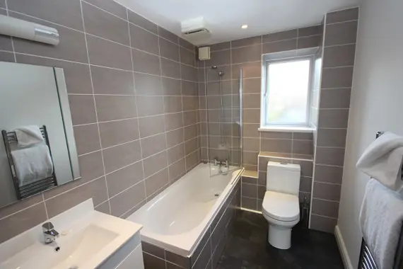 A modern bathroom with a relaxing bath