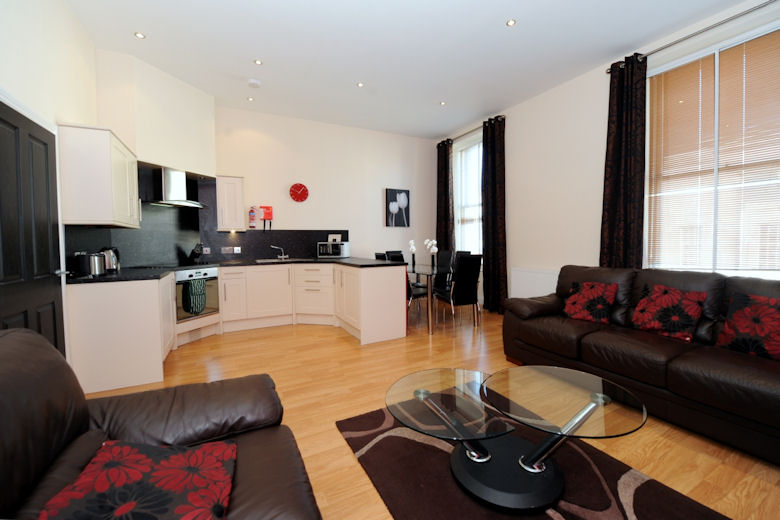 A lovely living space with high ceilings