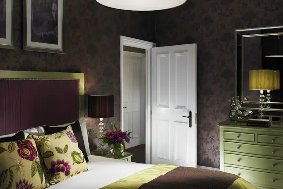 A beautifully decorated Jubilee suite double bedroom