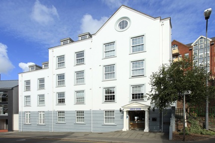 The exterior of SACO Merlin House Apartments in Jersey