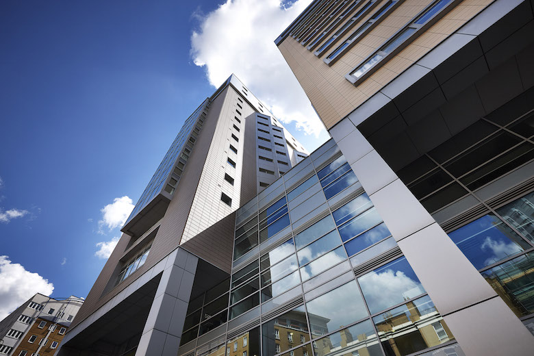 The exterior of the Aldgate East Apartments building