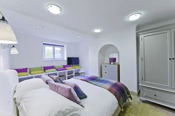 A stunningly decorated bedroom in the Lower Garden Suite