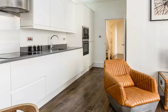 A sleek kitchen with ample storage!