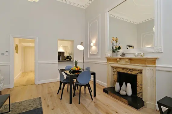 A modern dining area in a deluxe studio apartment