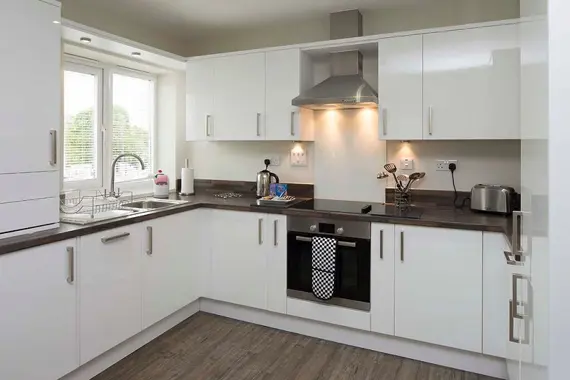 A bright, modern kitchen with plenty of cupboard space