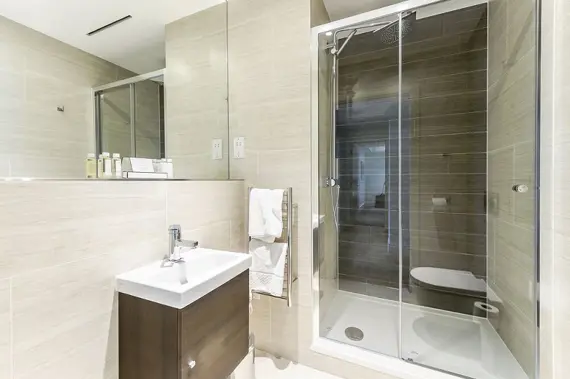 A modern, clean shower room in the two bedroom apartment