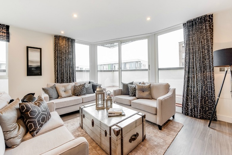 The luxurious, grand living area in the three bedroom apartment