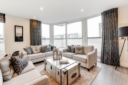 The luxurious, grand living area in the three bedroom apartment