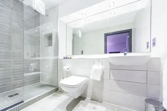 The bathrooms at Roomzzz Chester are bright and modern