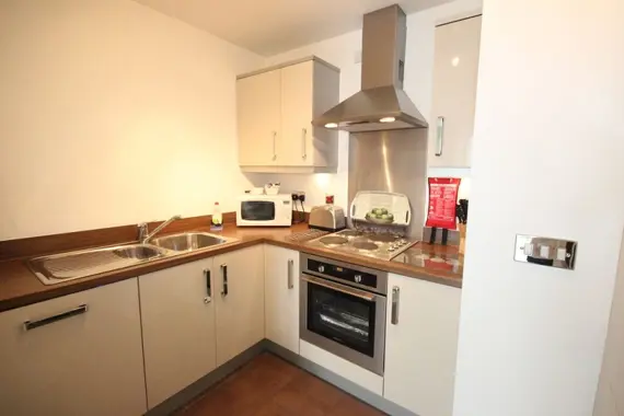 A well equipped kitchen in an executive one bedroom apartment