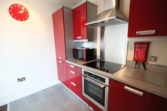 A chic, bright kitchen in a one bedroom apartment