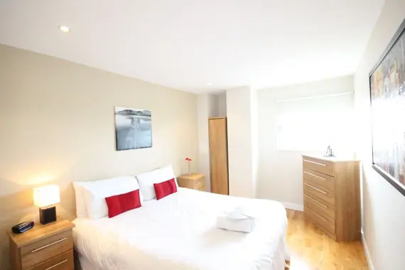A bright bedroom in a two bedroom apartment