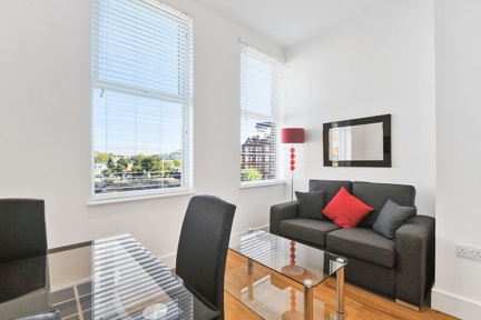 A bright, cosy living space in a small two bedroom apartment