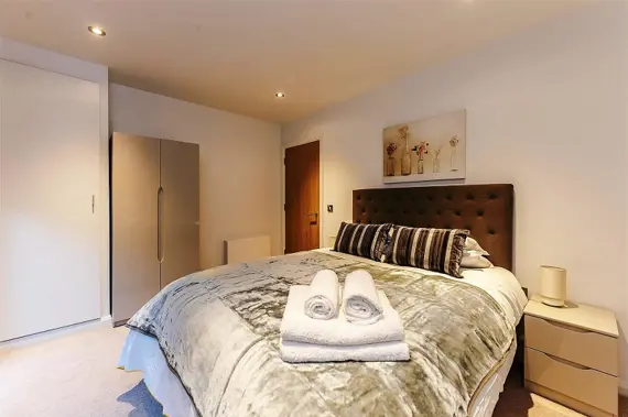 A large, comfortable bedroom