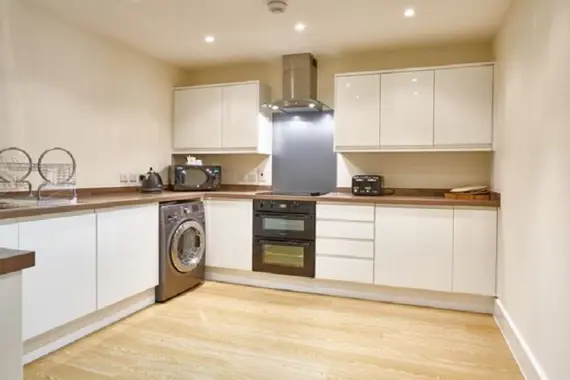 A modern, sleek fully equipped kitchen